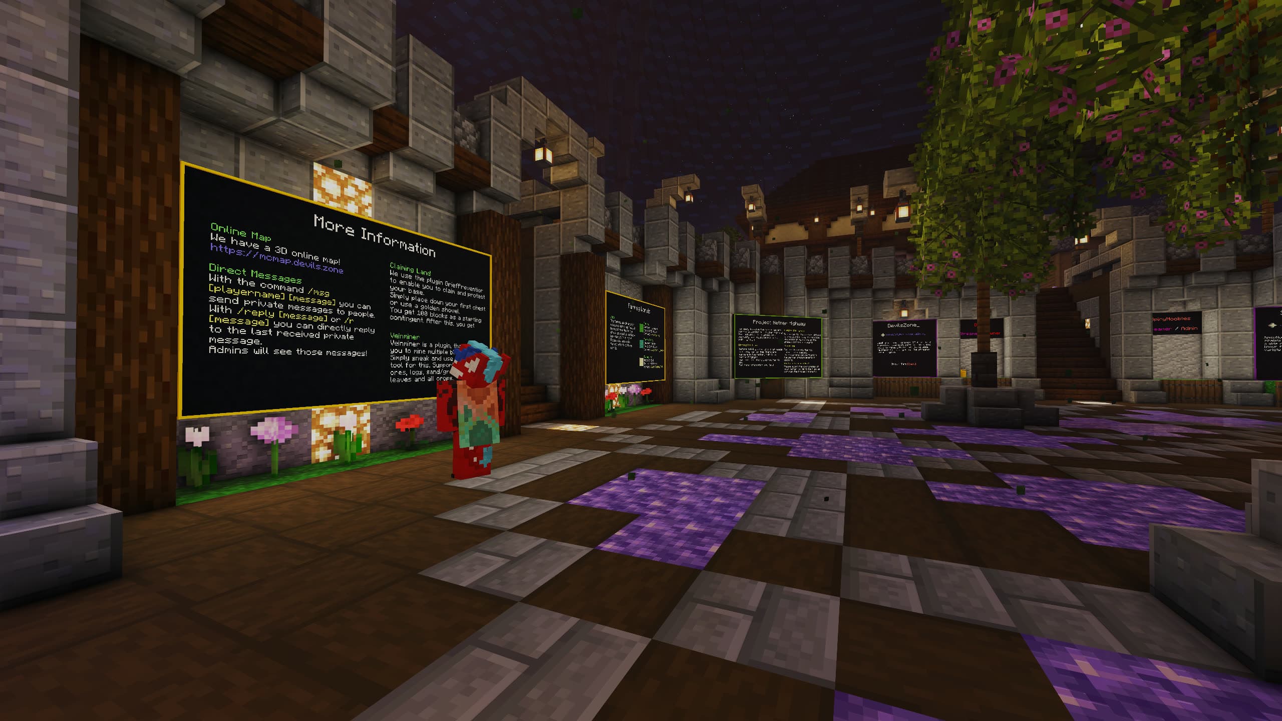 An information board at spawn explaining the online map and the chat commands