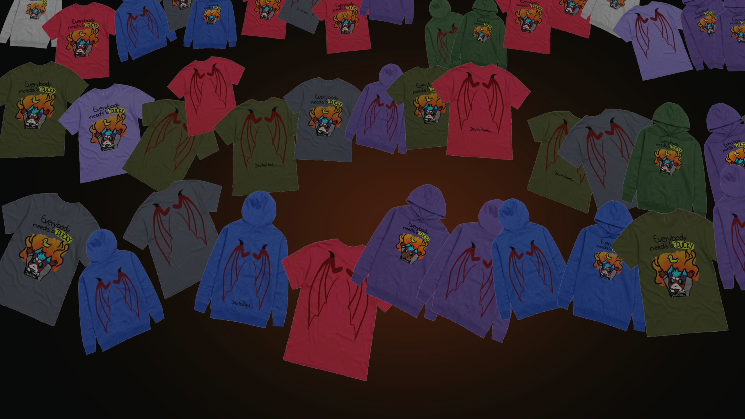 A spread of hoodies and t-shirts with the DUCKY and wings prints, tilted away into the dark